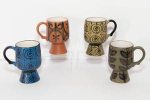 lot 75 image: MCM Chalice Mugs - Set of Four