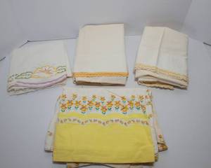 lot 180 image: Set of Four Vintage Cotton Pillowcases with Yellow Embroidered Edging - High Quality Cotton