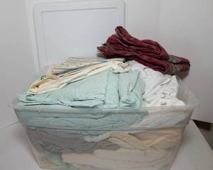 lot 216 image: Tote of Miscellaneous Linens  Tablecloths, Sheets, Pillowcases & More