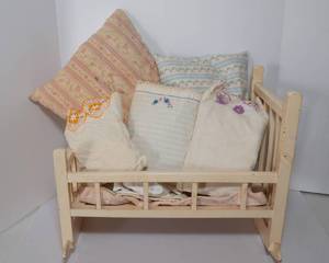 lot 214 image: Doll bed with Childrens Pillows and Pillowcases