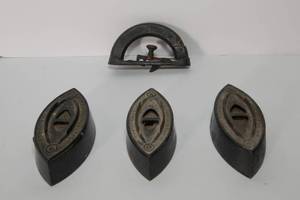 lot 222 image: Three Antique Sad Irons and Iron Handle