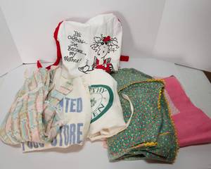 lot 224 image: Six Aprons