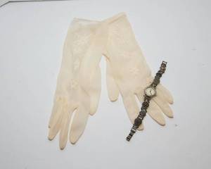 lot 340 image: Delicate Gloves and Intricate Watch
