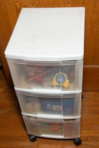 lot 337 image: Plastic Container with Mystery Contents