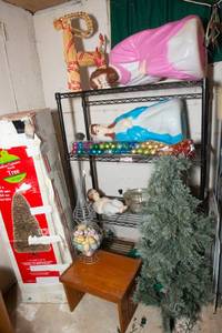 lot 369 image: Shelf and Contents - Includes Vintage Blow Mold Nativity set, Scandinavian Straw Yule Goat, 2 Trees and More