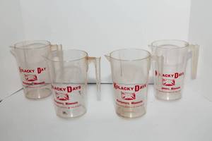 lot 378 image: Montgomery, MN Vintage Kolacky Days Pitchers - Set of 4