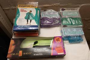 lot 427 image: Gold N Hot 12 Spring Grip Professional Curling Iron, Shampoo Capes and Hair Rollers