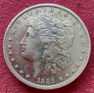 lot 69 image: 1889-O Morgan Dollar
