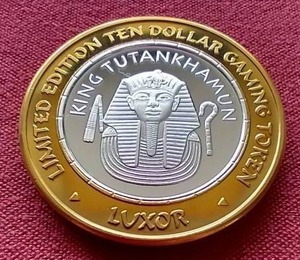 lot 83 image: Luxor Las Vegas Silver Strike .999 Gaming Token