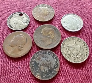 lot 90 image: (7) Vintage Foreign Coins