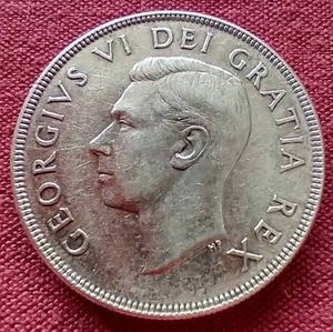 lot 101 image: 1949 Canada Silver Dollar