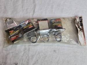 lot 32 image: Rigid Pickup Stake Pocket Anchors  4-Pack