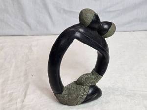 lot 35 image: Handcrafted Stone Sculpture with Abstract Design