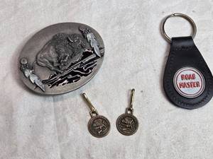 lot 42 image: Small North American Hunting Club Keychains and Buffalo Belt Buckle
