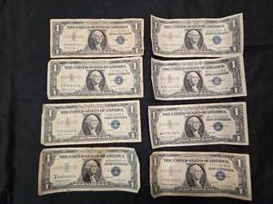 lot 56 image: Lot of 8 1957 B Series $1 Silver Certificates