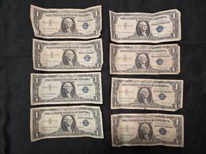 lot 57 image: Lot of 8 1957 B Series $1 Silver Certificates
