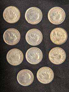 lot 66 image: Set of 11 Vintage Canadian 10-Cent Coins from the 30s, 40s, 50s - Silver Content