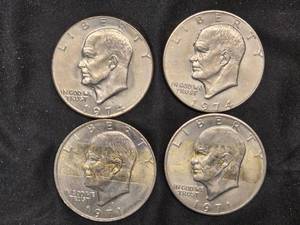 lot 90 image: Lot of 4 Eisenhower Silver Dollars - 2 from 1974, 2 from 1972