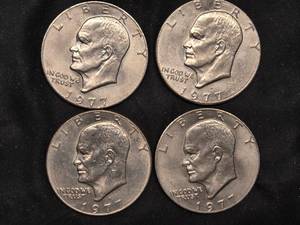 lot 91 image: Lot of 4 Eisenhower Silver Dollars from 1977