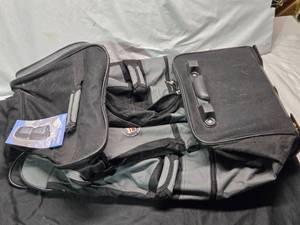 lot 108 image: 29-inch 6-Pocket Rolling Duffel Bag with Cadillac Logo