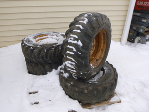 lot 2 image: 4 Goodyear Skid Steer Tires on Rims