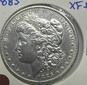 lot 57 image: 1885 Morgan Silver Dollar XF