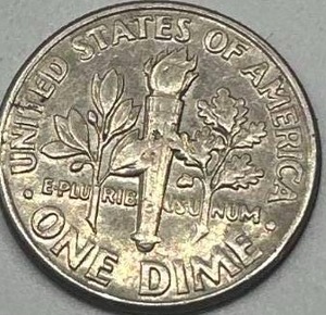 lot 81 image: Penny  Dime Magician Coin