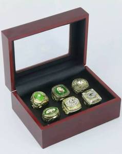 lot 4 image: Brand New Green Bay Packers NFL Championship 6 Ring Set with Display Box O