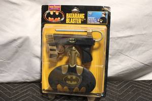 lot 8 image: Vintage Batman Batarang Blaster Action Toy in Original Packaging