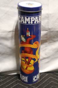 lot 23 image: Vintage Campari Metal Tin Container with Colorful Design