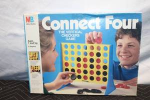 lot 29 image: Connect Four Board Game by Milton Bradley