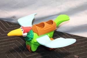 lot 35 image: Flintstone Kids Bedrock Airlines Prehistoric Airplane Toy by Coleco