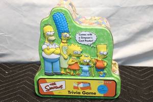 lot 38 image: The Simpsons Trivia Game with Cast Poster
