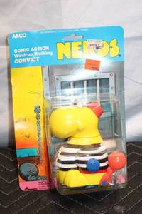 lot 87 image: Vintage ARCO Comic Action Wind-Up Walking Convict Toy