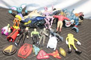 lot 95 image: Collection of Assorted Action Figures and Character Badges