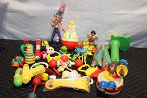 lot 100 image: Large Collection of Vintage and Modern Toys including Figures and Musical Instruments