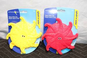 lot 105 image: Set of 2 Outdoor Fun Flying Water Discs - Yellow and Red