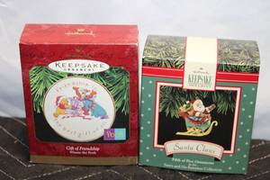 lot 137 image: Set of 2 Hallmark Keepsake Ornaments - Santa and Winnie the Pooh
