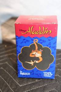lot 148 image: Disneys Aladdin Ornament Featuring Abu by Enesco Treasury
