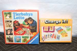lot 180 image: Set of 2 Family Board Games Charge It and Tierbabys Lotto