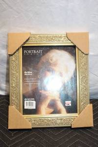 lot 192 image: Decorative 8x10 Portrait Frame with Ornate Border