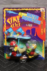 lot A-309 image: Fire Flies Water Squirters Action Figure Set