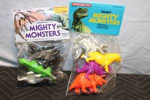 lot A-313 image: Lot of 2 Packs of Mighty Monsters Dinosaur Toys