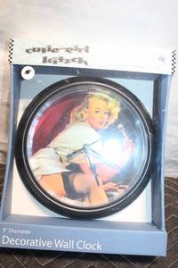 lot A-340 image: 9 Diameter Decorative Wall Clock with Pin-up Design