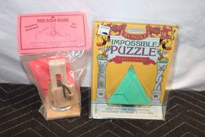 lot 391 image: Pyramid 4-Piece and Ring Game Puzzle Set
