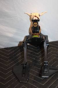 lot 468 image: Vintage Action Figure with Bull Head and Robotic Legs