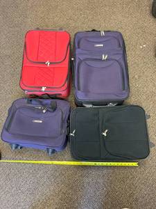 lot 106F image: Luggage Set of 4 Suitcases - Red, Purple, Black
