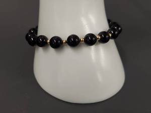 lot 21W image: 14K Gold & Black Stone Bead Bracelet