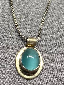 lot 100B image: Sterling Silver Necklace with Blue Stone Pendant
