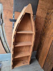 lot 7 image: Wooden Boat-Shaped Bookcase with Three Shelves Approx. 71 x 24